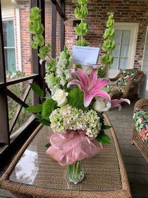 Original heromans  Send 10 Purple Tulips in a Vase floral arrangement throughout Baton Rouge & Zachary, LA and surrounding areas